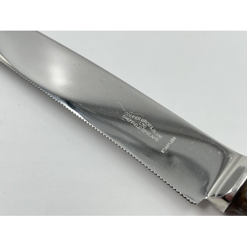 1174 - A Cooper Bros & Sons Ltd hallmarked Sheffield silver handled cake knife, dated 1974 - approx. 26cm l... 