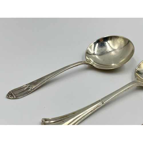 1176 - Three pieces of silver, one .800 silver pickle fork and two hallmarked Sheffield silver condiment sp... 