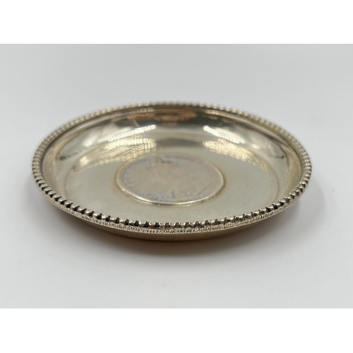 1181 - A stamped silver circular dish with George V 1917 Indian one rupee coin insert - approx. gross weigh... 