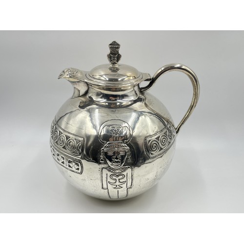 1183 - A Peruvian stamped .900 silver water jug - approx. gross weight 720 grams and 23cm high