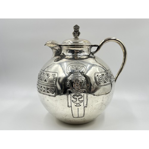 1183 - A Peruvian stamped .900 silver water jug - approx. gross weight 720 grams and 23cm high