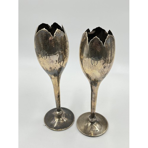 1184 - A pair of Walker & Hall hallmarked Sheffield silver weighted tulip vases, dated 1911 - approx. gross... 