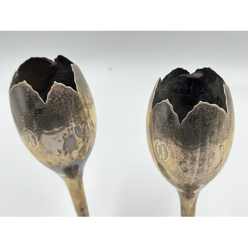 1184 - A pair of Walker & Hall hallmarked Sheffield silver weighted tulip vases, dated 1911 - approx. gross... 