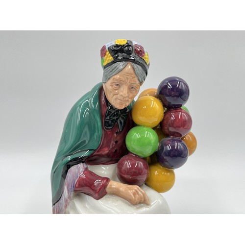 201 - A Royal Doulton The Old Balloon Seller figurine - HN 1315