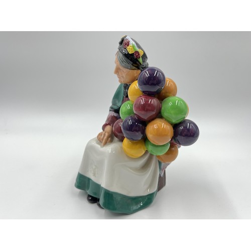 201 - A Royal Doulton The Old Balloon Seller figurine - HN 1315