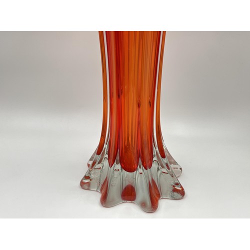 210 - A mid 20th century Murano red glass vase - approx. 35cm high