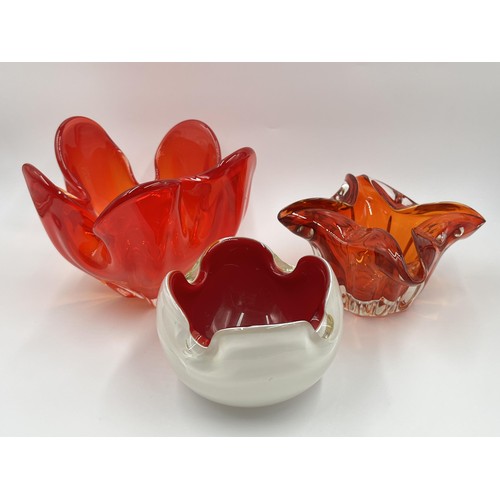 217 - Three studio glass bowls to include Amberina etc.