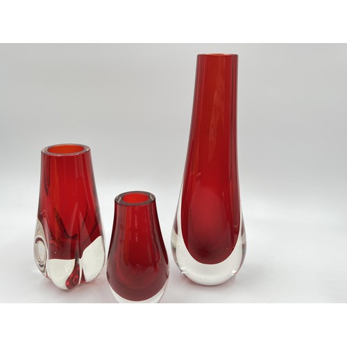 224 - Four pieces of mid 20th century red studio glassware to include Murano Sommerso pitcher etc. - large... 