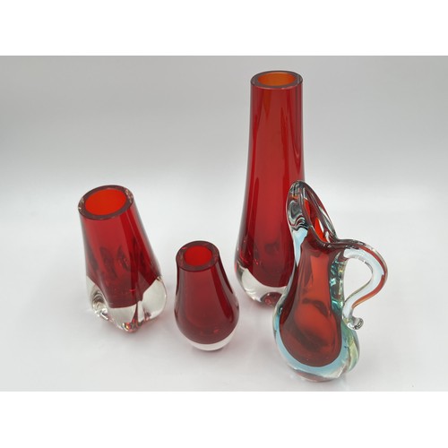 224 - Four pieces of mid 20th century red studio glassware to include Murano Sommerso pitcher etc. - large... 