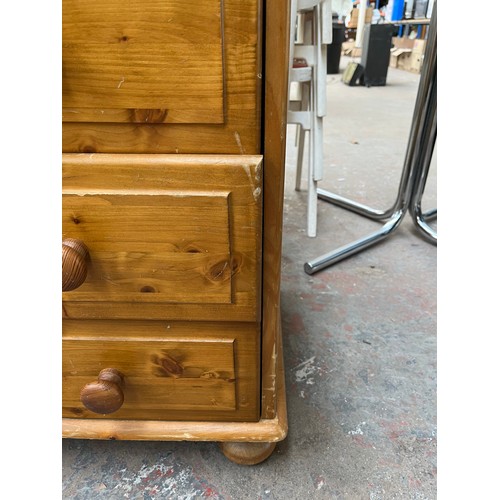 116 - A modern pine chest of two short over three long drawers - approx. 80cm high x 77cm wide x 45cm deep