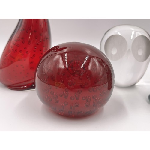 227 - Four studio glass paperweights - largest approx. 18cm high