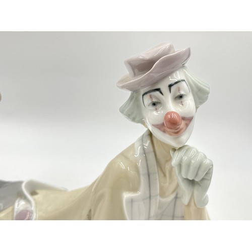 231 - A Lladro Recumbent Clown figurine, model no. 4618 - approx. 16cm high x 37cm long