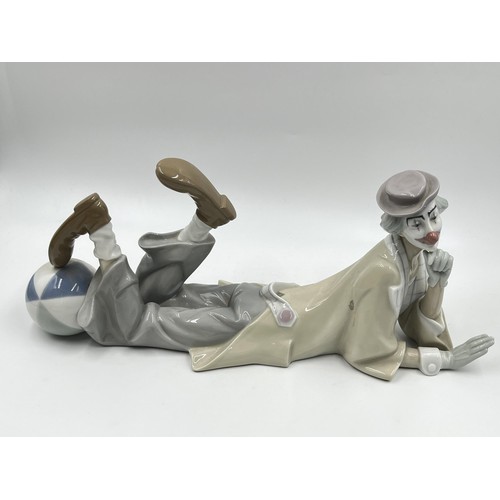 231 - A Lladro Recumbent Clown figurine, model no. 4618 - approx. 16cm high x 37cm long