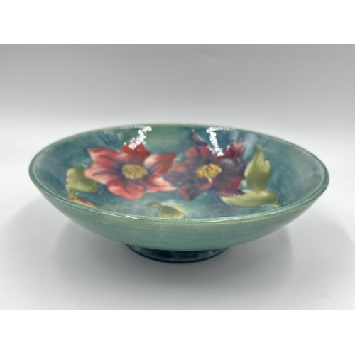 238 - A Moorcroft Clematis pattern circular pedestal bowl - approx. 6cm high x 19cm diameter