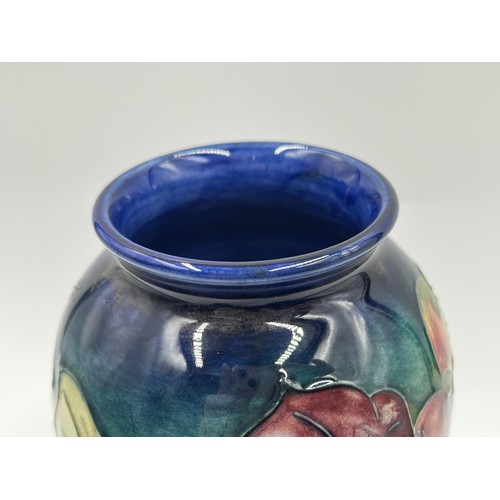 239 - A Moorcroft Clematis pattern baluster vase - approx. 18cm high