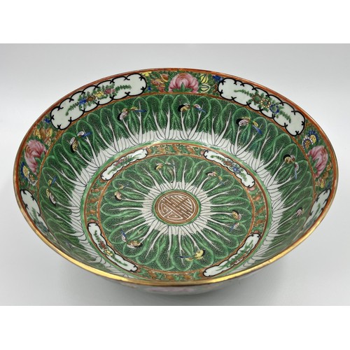 241 - A Chinese Famille Vert porcelain circular footed bowl - approx. 11cm high x 26cm diameter