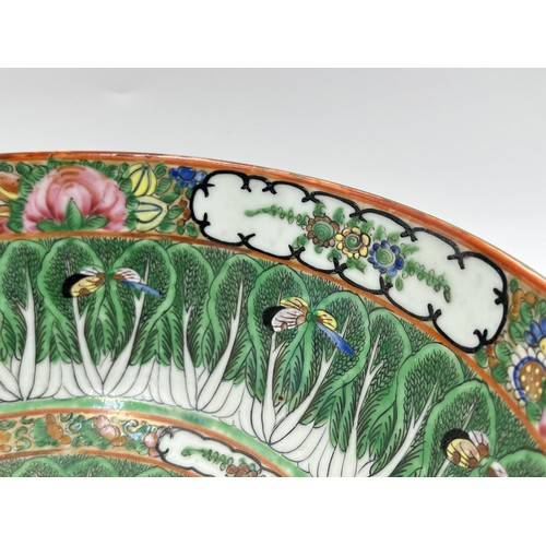 241 - A Chinese Famille Vert porcelain circular footed bowl - approx. 11cm high x 26cm diameter