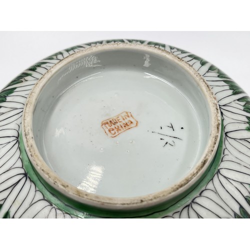 241 - A Chinese Famille Vert porcelain circular footed bowl - approx. 11cm high x 26cm diameter