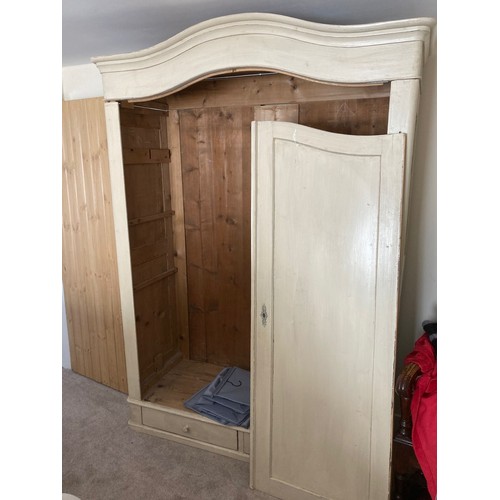 24 - A Victorian style painted pine double wardrobe with two lower drawers