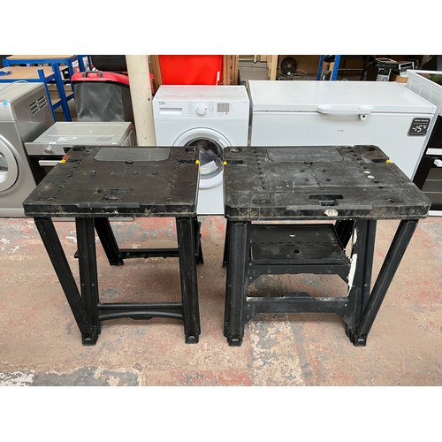 706 - Two Stanley plastic folding workbenches