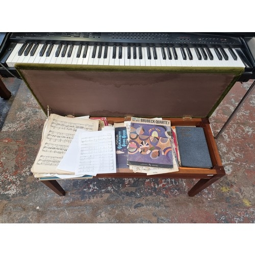 630 - A Yamaha Clavinova CVP-20 Electric Piano with Tannoy 623 speaker and duet stool containing sheet mus... 