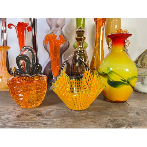 265 - Twenty one pieces of mid 20th century studio glassware to include Dalian vase, Murano style vases et... 