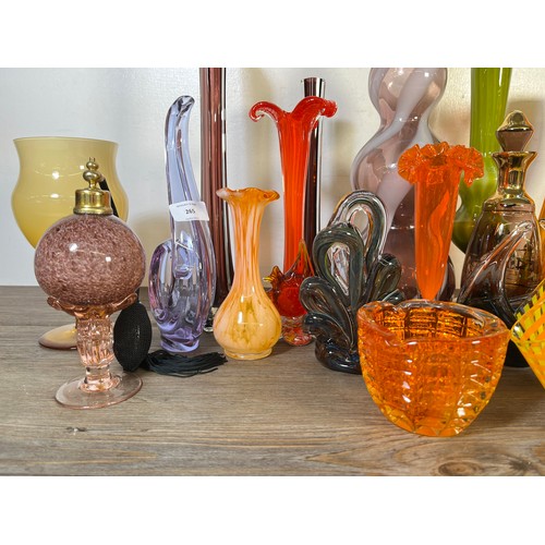 265 - Twenty one pieces of mid 20th century studio glassware to include Dalian vase, Murano style vases et... 