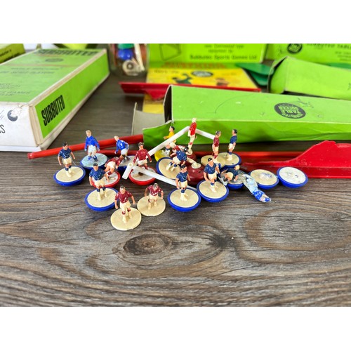 336 - A collection of vintage boxed Subbuteo accessories to include 00 Scale Players, Miniature World Cup ... 