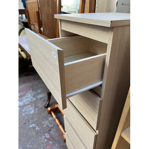 69 - Five pieces of modern furniture, three maple effect bookcases - largest approx. 202.5cm high x 80cm ... 