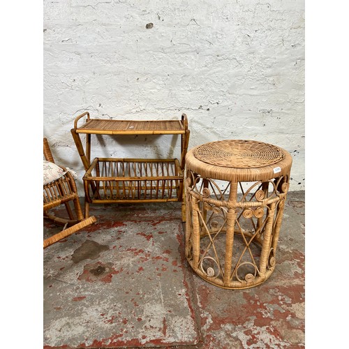 102 - Three pieces of wicker and bamboo furniture, one magazine rack side table, one child's rocking chair... 