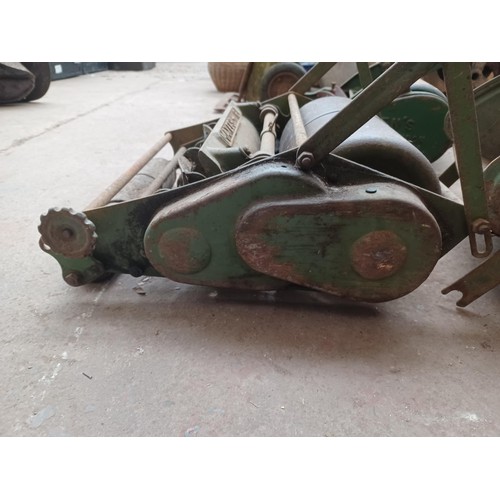 775 - An early/mid 20th century Maxees-12 cast metal lawnmower