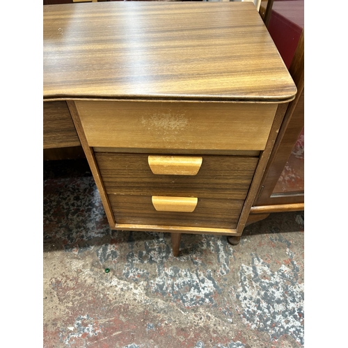 21 - Two pieces of Uniflex walnut and beech bedroom furniture, one dressing table and one bedside cabinet