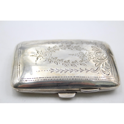 1304 - A George V hallmarked Birmingham silver cigarette case, dated 1921 - approx. gross weight 49 grams a... 