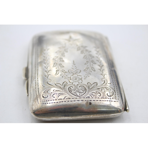 1304 - A George V hallmarked Birmingham silver cigarette case, dated 1921 - approx. gross weight 49 grams a... 