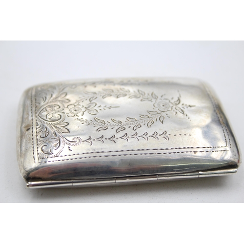 1304 - A George V hallmarked Birmingham silver cigarette case, dated 1921 - approx. gross weight 49 grams a... 