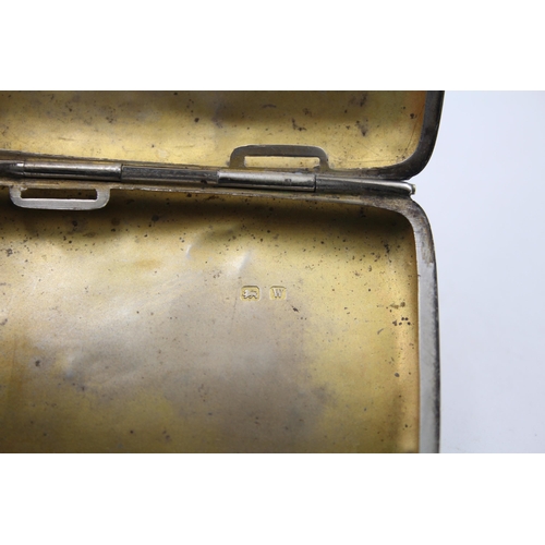 1304 - A George V hallmarked Birmingham silver cigarette case, dated 1921 - approx. gross weight 49 grams a... 