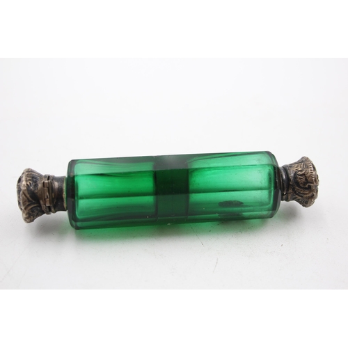 1305 - A Victorian emerald glass double ended scent bottle - approx. 11.5cm long x 2.5cm high