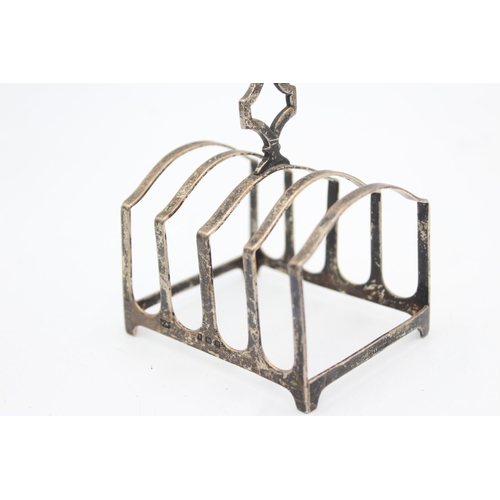 1307 - A George V hallmarked Birmingham silver toast rack, dated 1921 - approx. gross weight 59 grams and 7... 