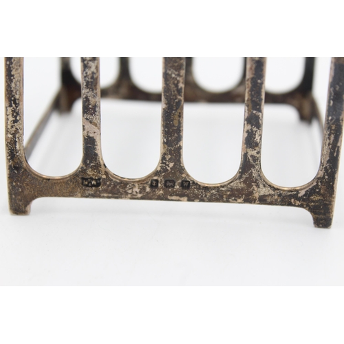 1307 - A George V hallmarked Birmingham silver toast rack, dated 1921 - approx. gross weight 59 grams and 7... 