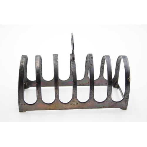 1312 - A Viners Ltd hallmarked Sheffield silver toast rack, date 1936 - approx. gross weight 73 grams