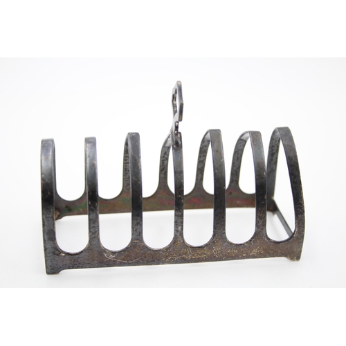 1312 - A Viners Ltd hallmarked Sheffield silver toast rack, date 1936 - approx. gross weight 73 grams