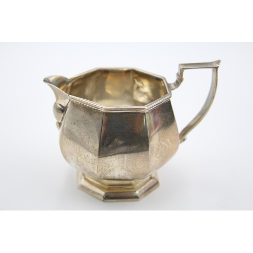 1316 - An Edwardian William Devenport hallmarked Birmingham silver cream jug, dated 1904 - approx. gross we... 