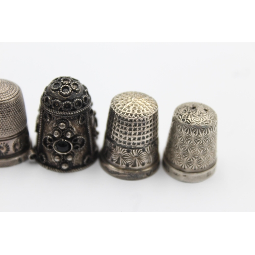 1320 - Six sterling silver thimbles to include Charles Horner etc. - approx. gross weight 34 grams