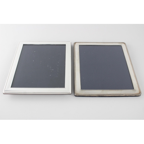 1326 - Two hallmarked sterling silver photo frames - approx. gross weight 1899 grams