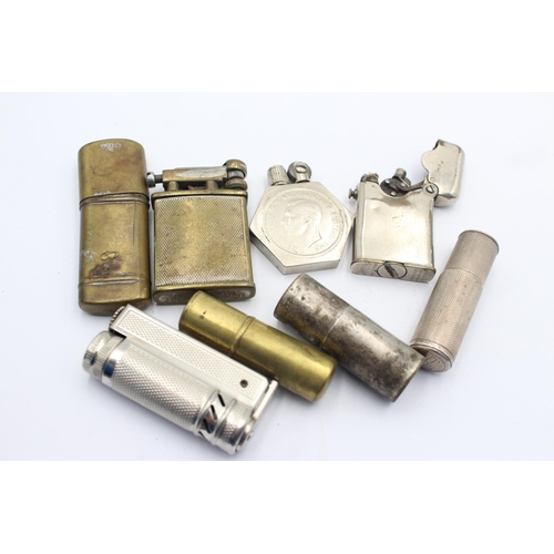 1335 - Eight vintage cigarette lighters