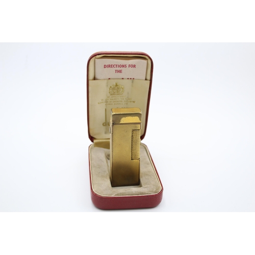 1336 - A boxed Dunhill Rollagas gold plated cigarette lighter