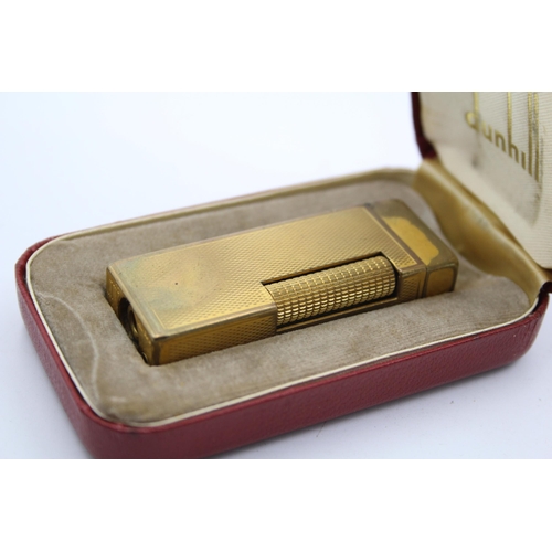 1336 - A boxed Dunhill Rollagas gold plated cigarette lighter