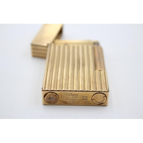 1342 - A vintage S.T. Dupont gold plated cigarette lighter