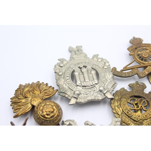 1350 - Ten cap badges to include Welsh Guards, KOSB, Royal West Kent etc.