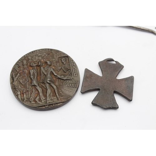 1359 - A WWI R.M.S Lusitania medal, Iron Cross and trench art button hook